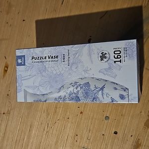 New never opened. Puzzle Vase